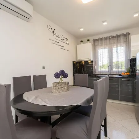 Holiday home Lovely In