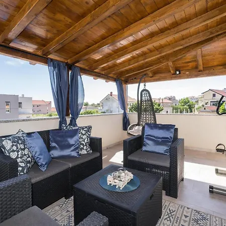 Holiday home Lovely In